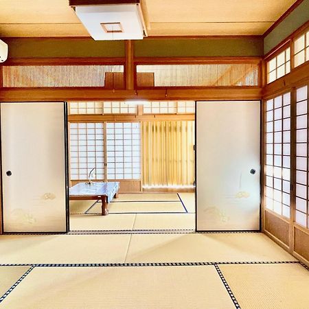 島の民泊 天川 -てぃんご- Tingo Japanese Kominka Stay Tatsugo Bagian luar foto